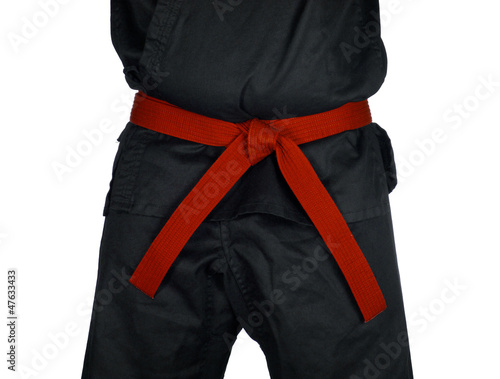Photo: Karate Red Belt Tied Around Torso Black Uniform Karate Red Belt Tied Around Torso Black Uniform