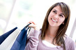 Pensive shopping woman