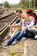 Woman resting on man's shoulder backpack travel