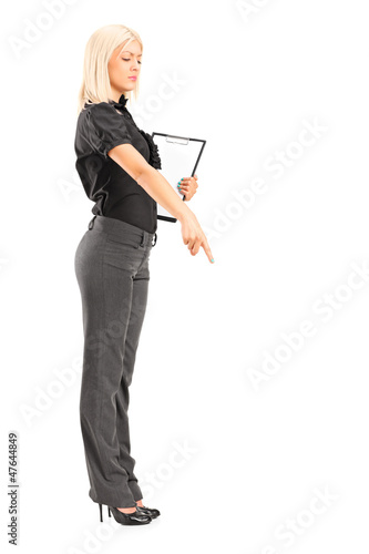 Photo: Brutal woman manager gesturing with her finger Brutal woman manager gesturing with her finger