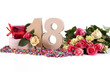Photo: Age in figures, decorated with roses Age in figures, decorated with roses