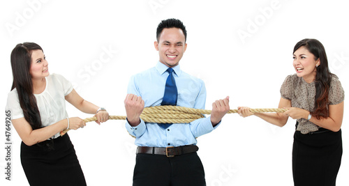 Photo: man executive tied by his employee man executive tied by his employee