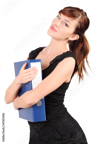 Photo: Girl in black hugs large blue folder isolated on white Girl in black hugs large blue folder isolated on white