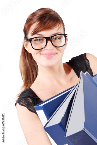 Photo: Happy girl in big glasses holds three large blue folders Happy girl in big glasses holds three large blue folders