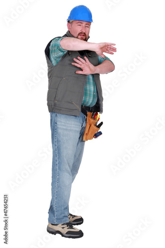 Photo: Scared male builder Scared male builder