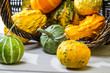 Closeup pumpkins on an wicker basket