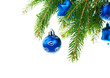 Christmas balls on branch of fir tree isolated on white backgrou