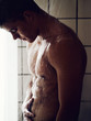 Photo: Rinsing off under the shower Rinsing off under the shower