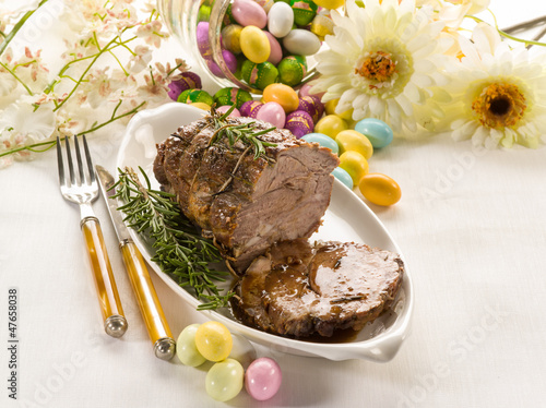 Photo: roasted meat over easter table roasted meat over easter table