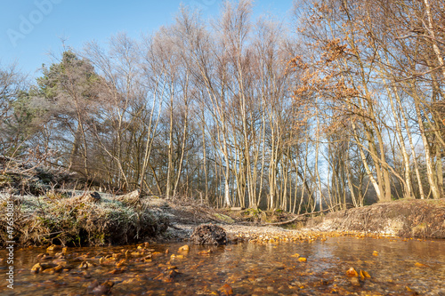 Photo: autumn landscape viewed from a riverbed autumn landscape viewed from a riverbed