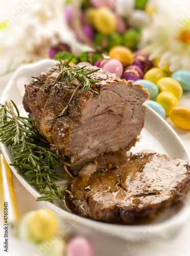 Photo: roasted meat over easter table, selective focus roasted meat over easter table, selective focus