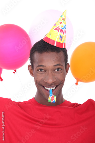 Photo: black man at birthday's party black man at birthday's party