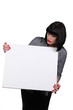 Foto: Young woman holding a blank sign Young woman holding a blank sign