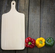Empty cutting board and paprika abstract background