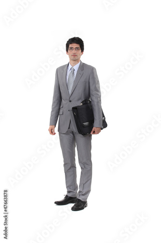 Photo: Executive with portfolio under his arm Executive with portfolio under his arm