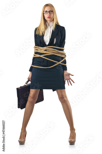 Photo: Tied woman in business concept Tied woman in business concept