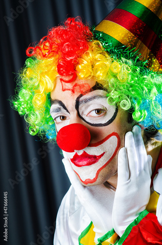 Photo: Funny clown in studio shooting Funny clown in studio shooting