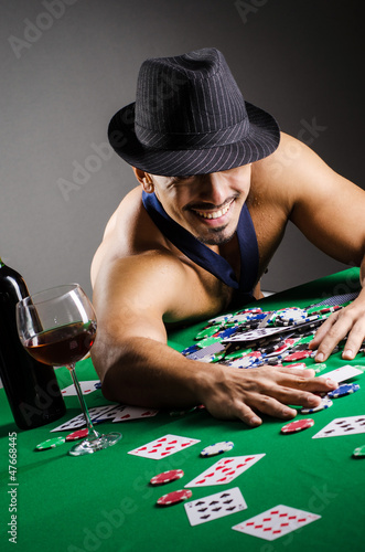 Photo: Naked broke businessman in casino Naked broke businessman in casino