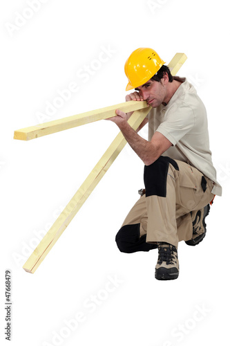 Photo: woodworker making a fence woodworker making a fence