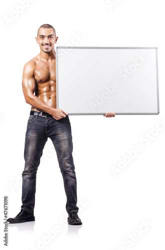 Photo: Naked man with blank board Naked man with blank board