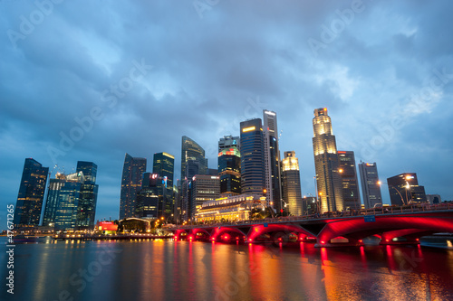 Photo: SINGAPORE - APRIL 23: The Singapore skyline shines at night. Si SINGAPORE - APRIL 23: The Singapore skyline shines at night. Si