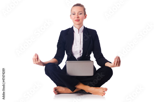 Photo: Businesswoman meditating isolated on white Businesswoman meditating isolated on white