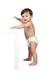 Cute Baby Besides a Table