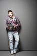 Foto: Smiling young urban man with a tablet Smiling young urban man with a tablet