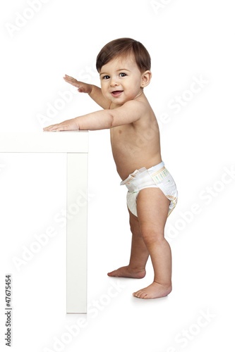 Photo: Cute Baby Besides a Table Cute Baby Besides a Table