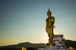 Golden Buddha statue in a Buddhist temple