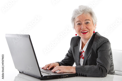 Photo: Ältere Dame mit Computer Ältere Dame mit Computer