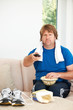 Countering all his hard working out with bad eating