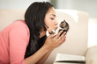 Giving her kitty a kiss!