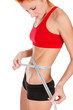 Woman measuring waist with a tape measure