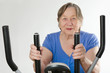 Senior woman on  training bicycle
