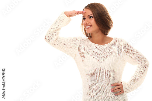 Photo: Attractive woman watching gesture over a white Attractive woman watching gesture over a white