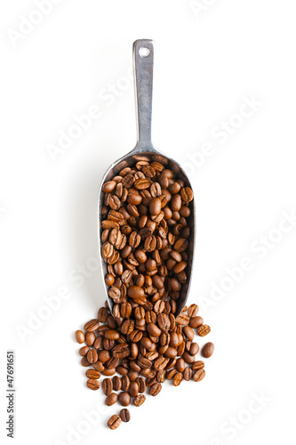 Photo: metal scoop with coffee beans metal scoop with coffee beans