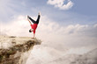 Acrobatic competition cartwheel on mountain