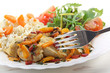 Sautéed fried breast chicken with vegetables and salad