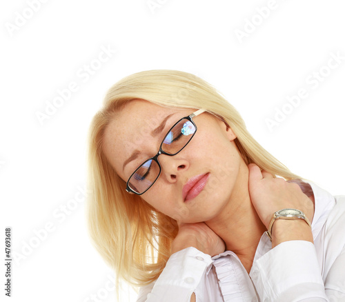 Photo: A businesswoman with a headache holding head A businesswoman with a headache holding head