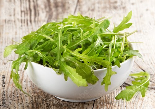 Photo: Rucola in white bowl Rucola in white bowl