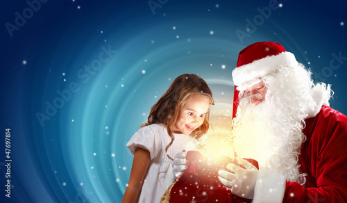 Photo: portrait of santa claus with a girl portrait of santa claus with a girl