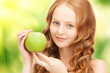 young beautiful woman with green apple