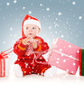 Photo: santa helper baby with christmas gifts santa helper baby with christmas gifts