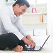 Asian man surfing internet