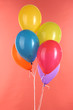 colorful balloons on red background