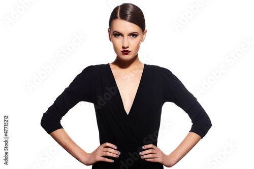 Photo: glamor sexy model with red lips,bright makeup in black dress glamor sexy model with red lips,bright makeup in black dress