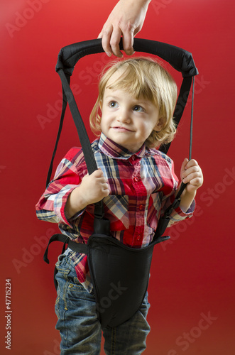 Photo: A Cute Baby making his First Steps A Cute Baby making his First Steps