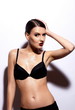 glamor sexy model with red lips,bright makeup in black lingerie