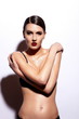 glamor sexy model with red lips,bright makeup in black lingerie